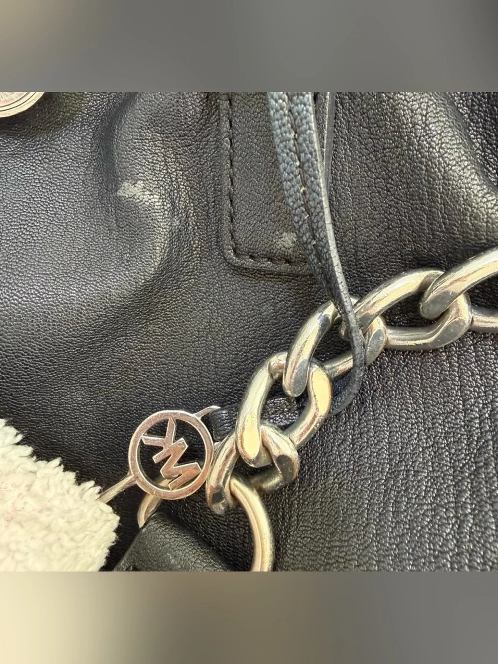 Black Leather Handbag with Silver Chain Accent